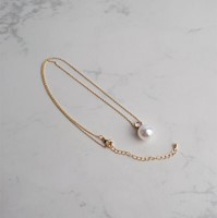 COLLAR CON PERLA GRANDE (DORADO)