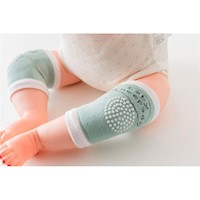 Protector de rodilla verde agua para bebe