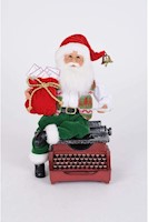 - Figura de Papá Noel con máquina de escribir,