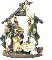 Estatua de el Niño Jesús en un pesebre y los 3 reyes magos