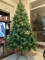 Arbol de Navidad frondoso con piñas de 180 cm.