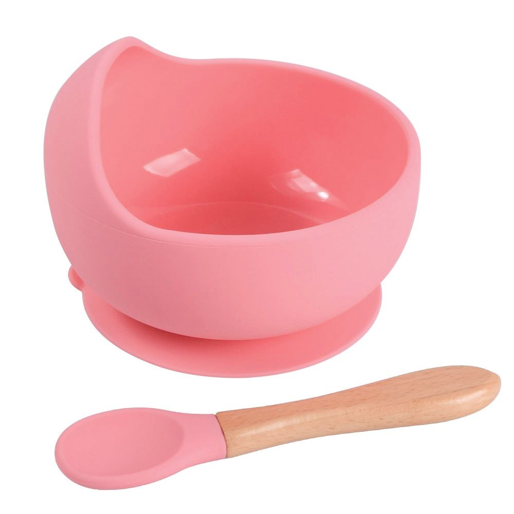 Cuenco de silicona rosado con cuchara para bebe