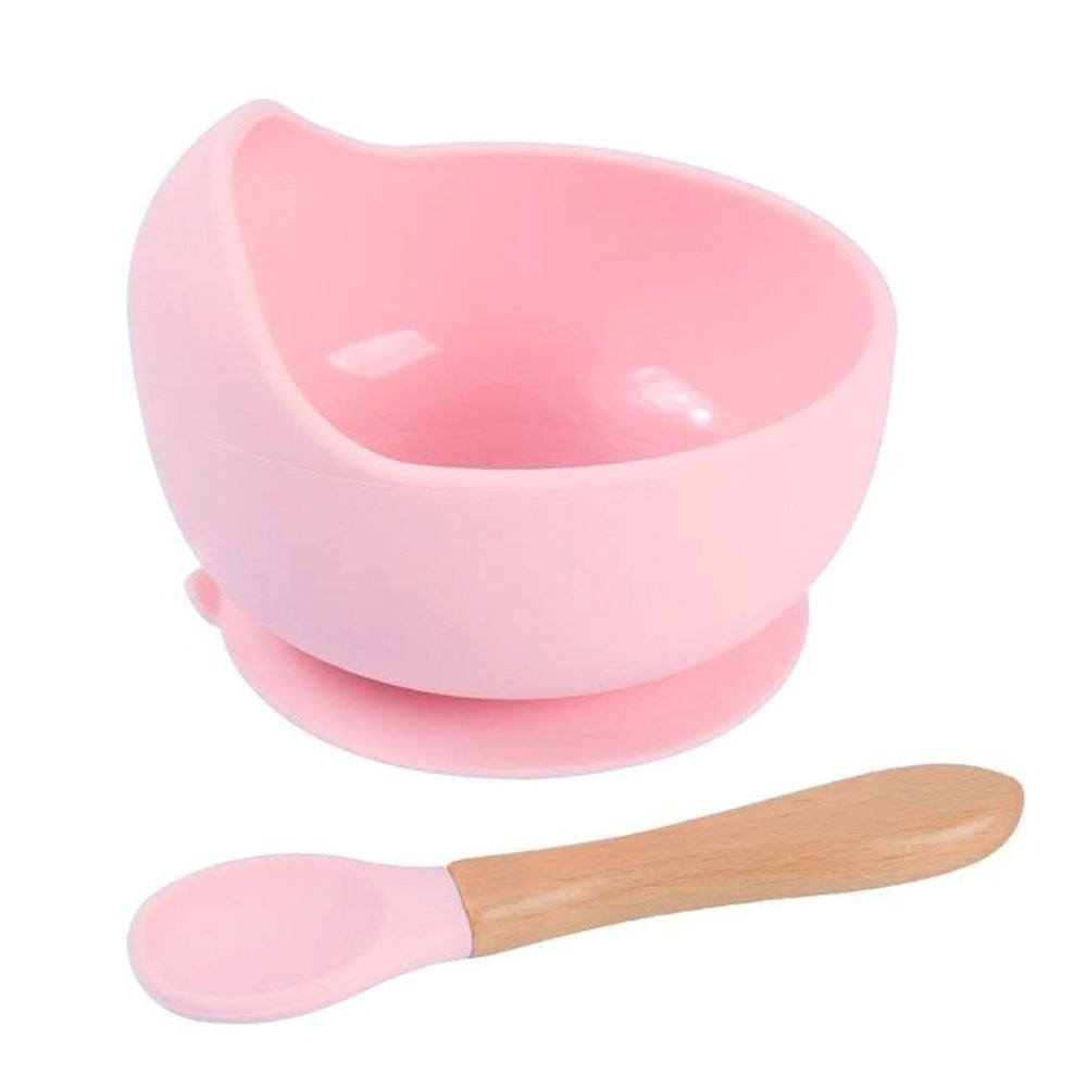 Cuenco de silicona rosado con cuchara para bebe
