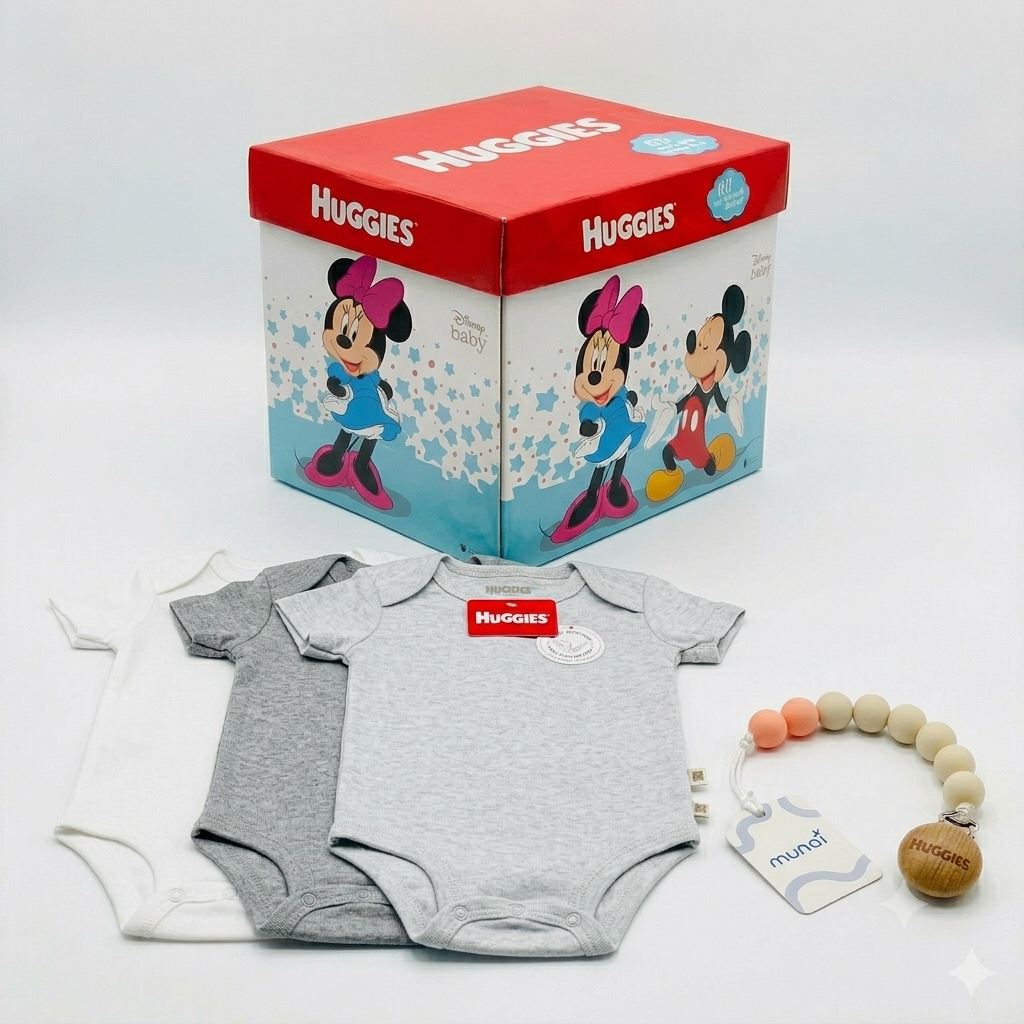 BODY NIÑO HUGGIES PACK X3 ALGODÓN ORGÁNICO GRIS JASPEADO 6 MESES + PORTACHUPÓN Y CAJA DISNEY DE REGALO
