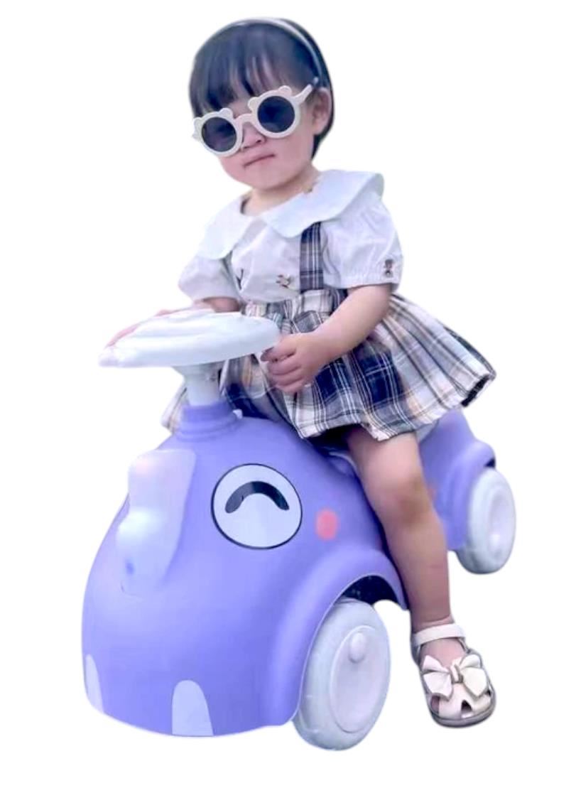 CARRITO DINO MORADO CON LUCES Y SONIDO. BUGGY CORREPASILLOS