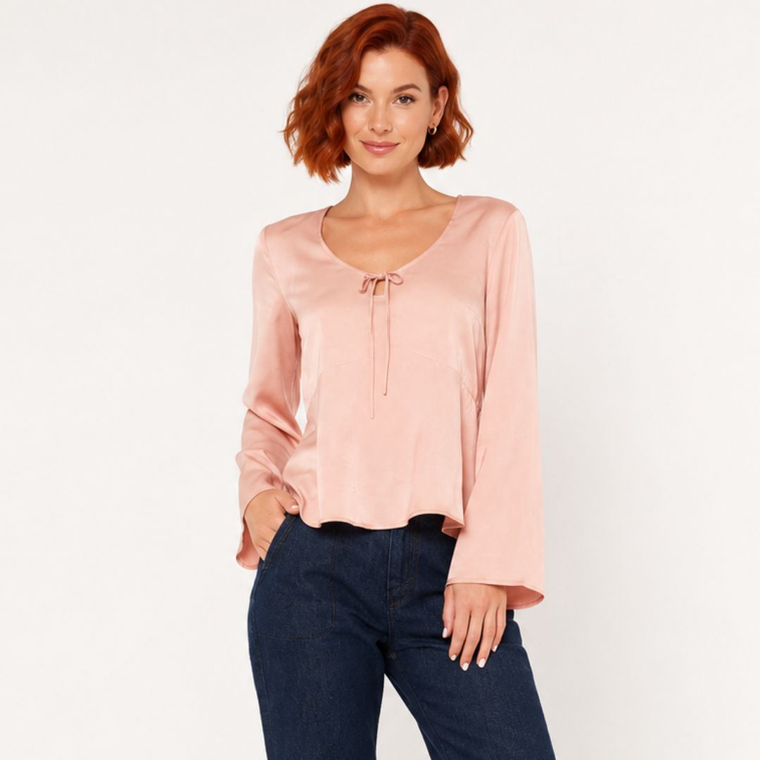 Blusa Femenina Rosada con Estilo Versátil y Acabado Elegante